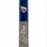 High-resolution image of a blue pewter Jerusalem mezuzah with detailed Hebrew engravings, set against a pure white background with a soft reflection.