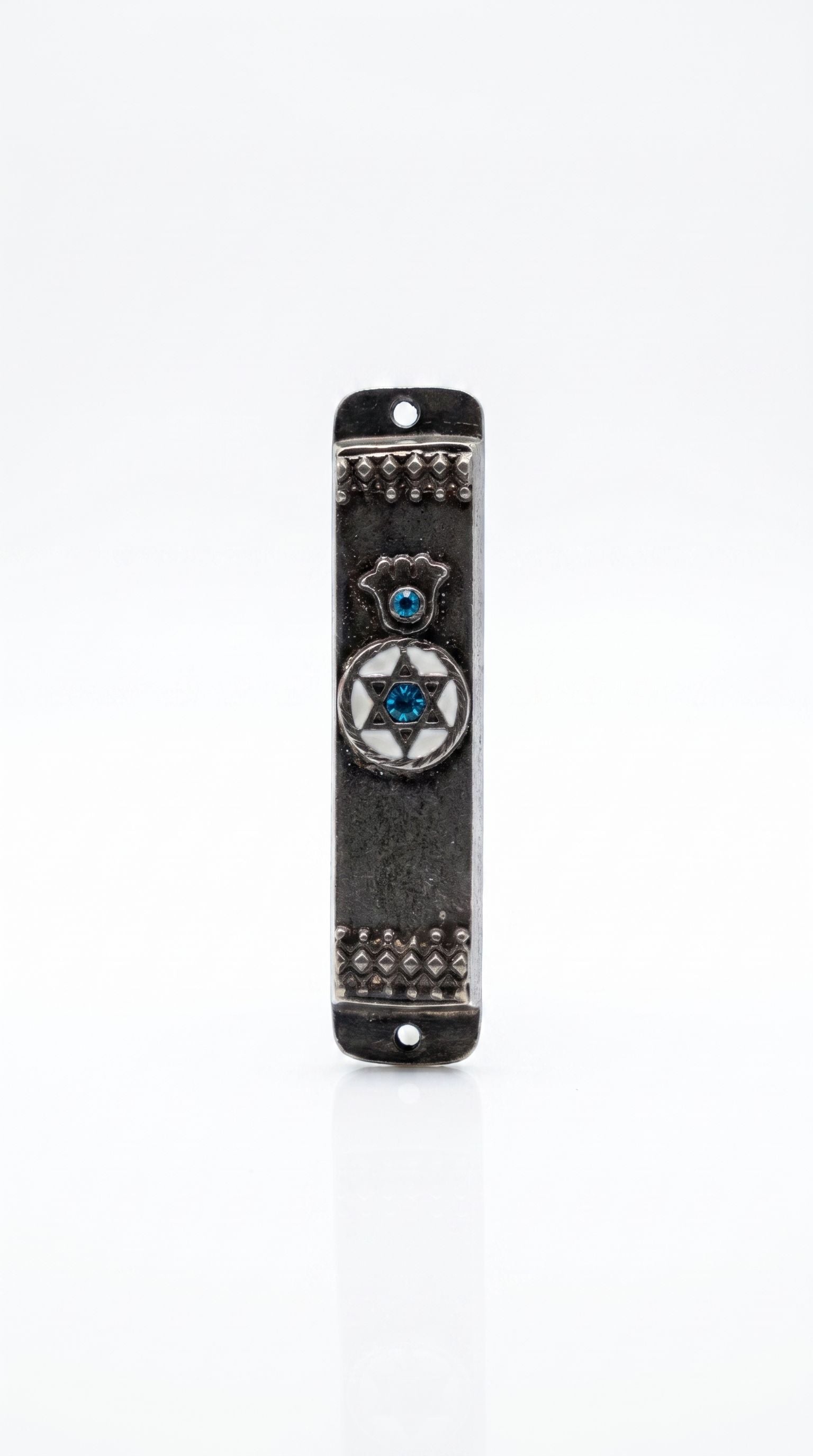 Antique-silver pewter car mezuzah made in Israel with a blue hamsa, circular Magen David, and decorative raised borders