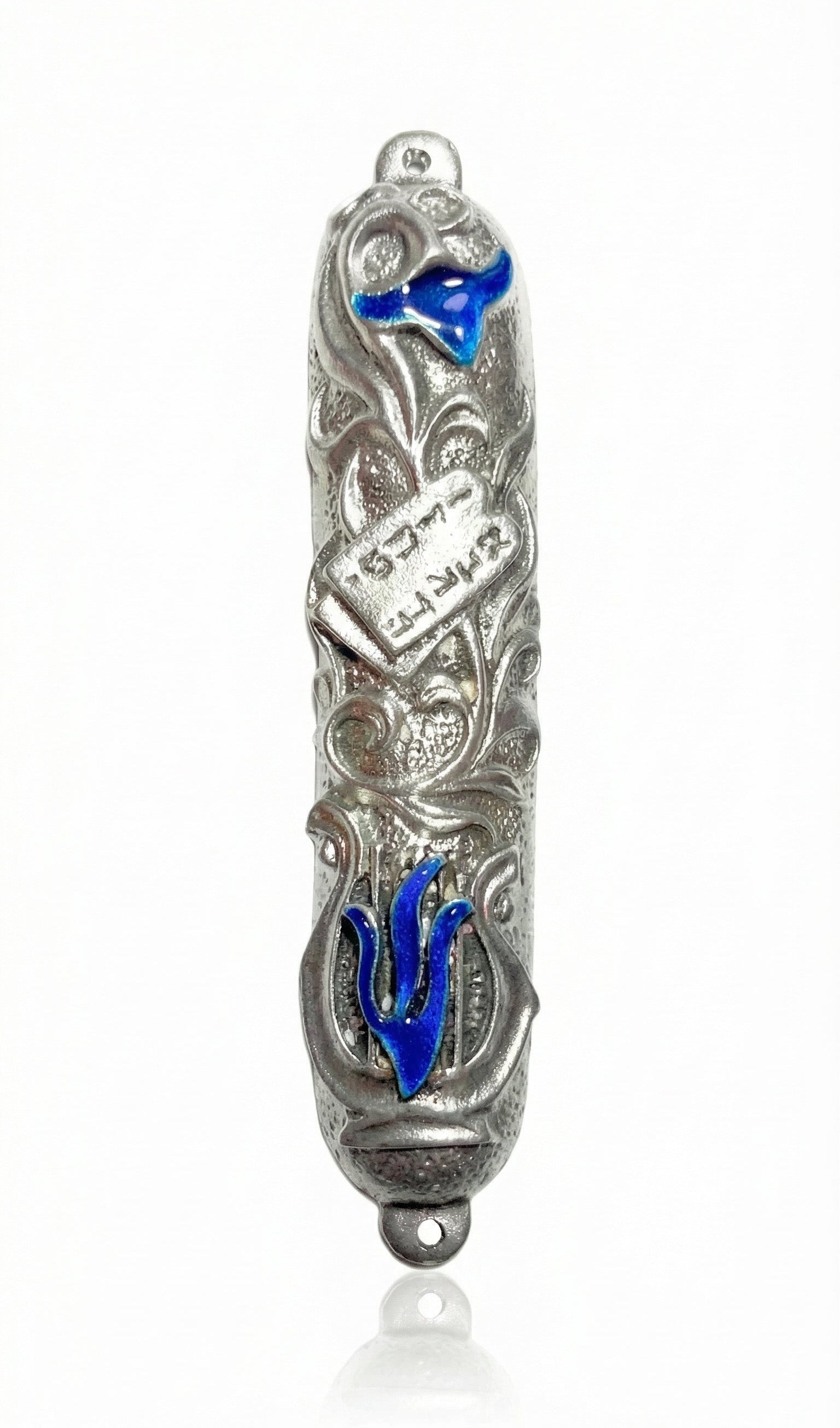 High-resolution image of a blue lily mezuzah made of pewter with enamel accents, featuring the Ten Commandments tablet among lily leaves, on a white studio background with soft reflection.