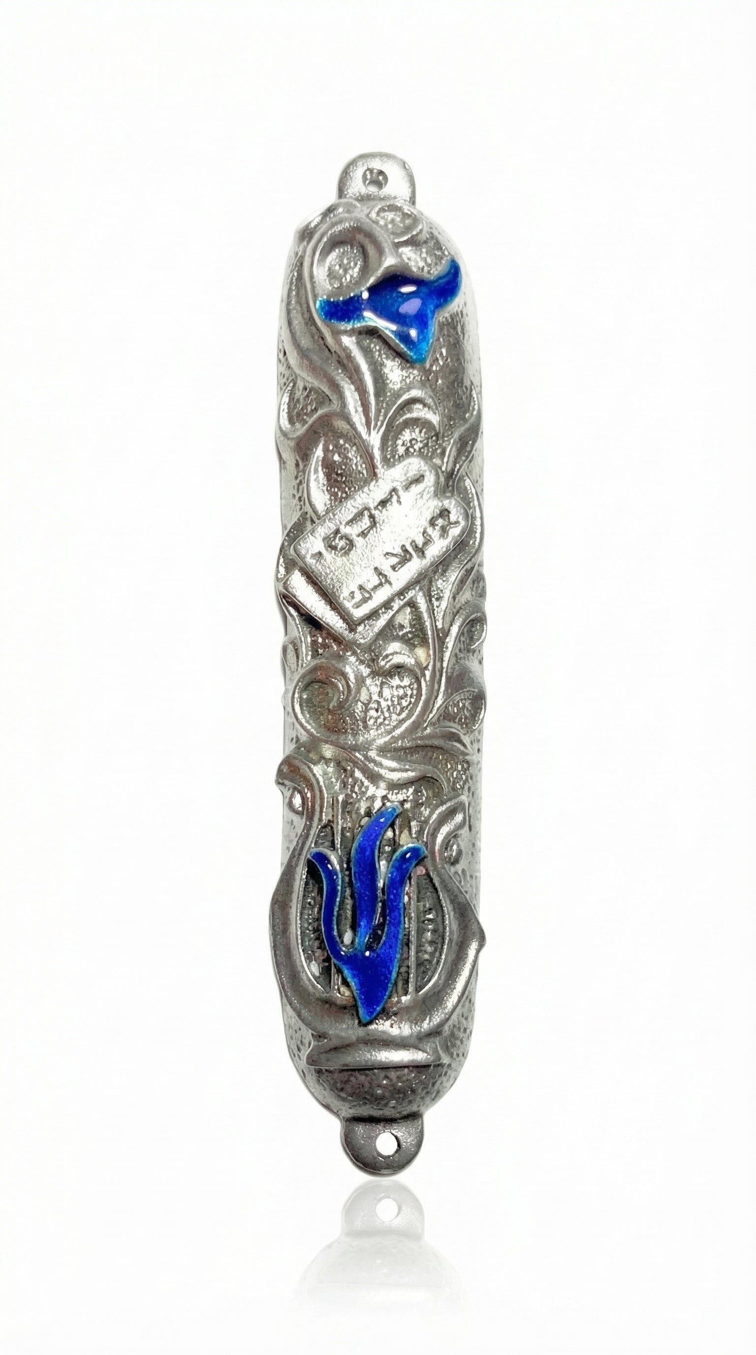 High-resolution image of a blue lily mezuzah made of pewter with enamel accents, featuring the Ten Commandments tablet among lily leaves, on a white studio background with soft reflection.