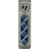 Blue Peace Mezuzah made of pewter with hand-painted enamel, featuring Hebrew symbols and decorative motifs, displayed on a white studio background with a soft reflection.