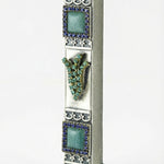 Petite blue stone mezuzah with Hebrew shin and sparkling accents showcasing detailed craftsmanship
