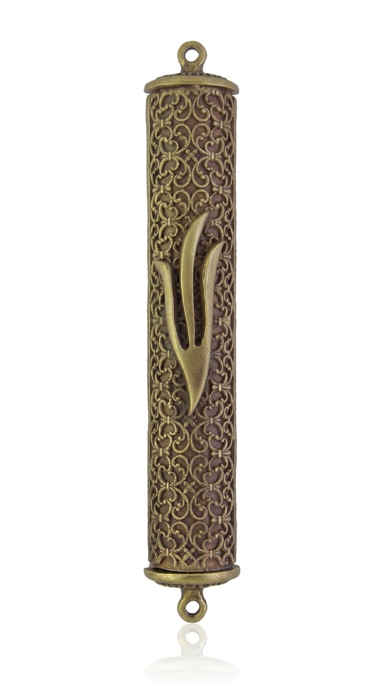 Elegant brass filigree mezuzah with intricate strands, measuring 5.3/8 inches tall, suitable for home doorways, with detailed engraved Hebrew letters.