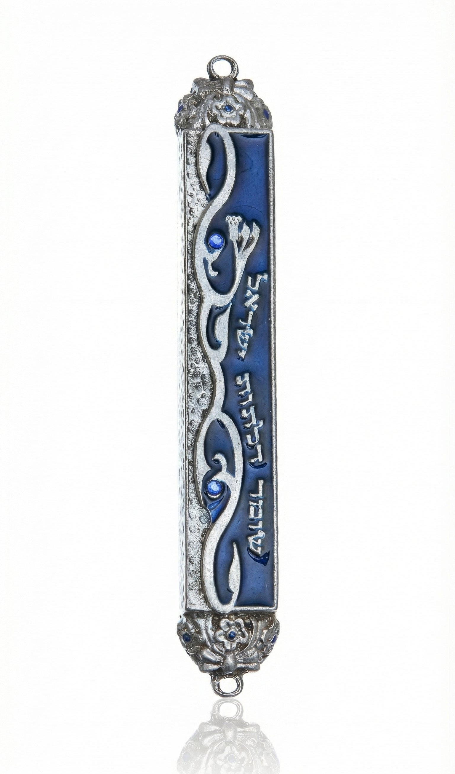 High-resolution image of an elegant Bright Sky Mezuzah with intricate painted pewter details, Hebrew inscription, and a clean white studio background with soft reflection.