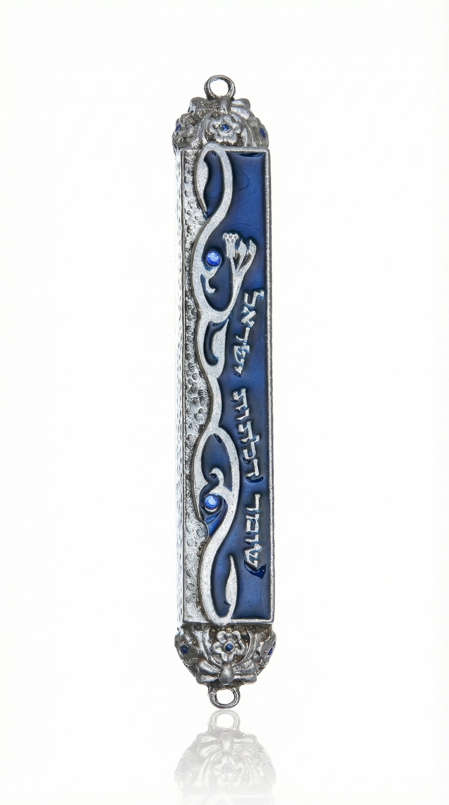 High-resolution image of an elegant Bright Sky Mezuzah with intricate painted pewter details, Hebrew inscription, and a clean white studio background with soft reflection.