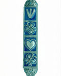 Decorative blue butterfly mezuzah made of pewter with enamel accents, featuring floral and butterfly motifs, ideal for home doorways.