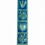 Decorative blue butterfly mezuzah made of pewter with enamel accents, featuring floral and butterfly motifs, ideal for home doorways.