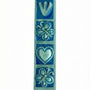 Decorative blue butterfly mezuzah made of pewter with enamel accents, featuring floral and butterfly motifs, ideal for home doorways.