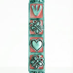 Pink butterfly and floral design mezuzah made of pewter with enamel, measuring 5.5 inches, suited for home doorways, includes scroll option.