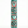 Pink butterfly and floral design mezuzah made of pewter with enamel, measuring 5.5 inches, suited for home doorways, includes scroll option.