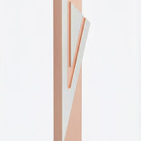 Pink aluminum Mezuzah with Hebrew inscriptions and decorative motifs, designed for outdoor use, mounted on a white background with subtle reflection.