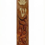 Carved wooden mezuzah made in Israel, 4.5 inches tall, with detailed engraved Hebrew letters, decorative motifs, and a polished finish.