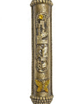 Elegant castle-shaped mezuzah with Hebrew G-d's name and a hovering yellow butterfly, set against a pure white studio background with soft reflection.
