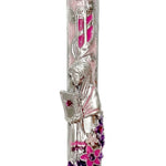 High-quality photograph of a celebration mezuzah featuring a floral blossom design with a girl holding a book, pink enamel background, exact details preserved.