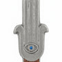 High-resolution image of a celestial Hamsa-shaped mezuzah with symbolic eye, accented with silver, turquoise, and brown sparkling paint, on a white background.
