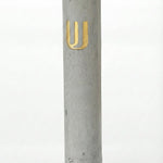 Elegant cement Mezuzah in gray with Shin gold inscription, 6 inches tall, designed for home doorways with strong mounting tape included.