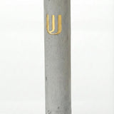 Elegant cement Mezuzah in gray with Shin gold inscription, 6 inches tall, designed for home doorways with strong mounting tape included.