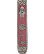 Vibrant pewter Mezuzah hand painted with enamel, adorned with charms like Chai, Star of David, fish, and Hamsa, on a white background with soft reflection.