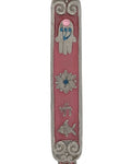 Vibrant pewter Mezuzah hand painted with enamel, adorned with charms like Chai, Star of David, fish, and Hamsa, on a white background with soft reflection.