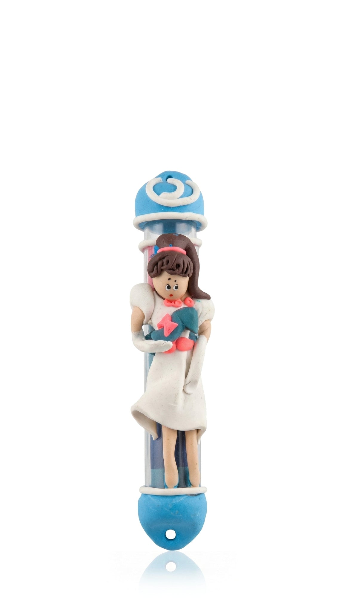 Cinderella children’s mezuzah cover with a hand-modeled princess figure in a pale dress, light blue rounded caps and a white Hebrew Shin, combining colorful Fimo polymer clay with a fairy-tale character design for a kid’s room doorway