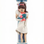 Handmade Cinderella Mezuzah crafted from fimo with protective glass tube, ideal for children's rooms, in bright studio setting with soft reflection.