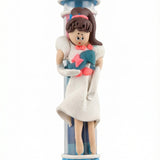 Handmade Cinderella Mezuzah crafted from fimo with protective glass tube, ideal for children's rooms, in bright studio setting with soft reflection.