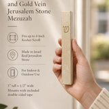 Hand holding the Classic Cream Gold Vein Jerusalem stone mezuzah case with raised gold Shin, shown beside product details for its 5-inch size, 4-inch kosher scroll fit, Israeli origin, and indoor or protected outdoor use