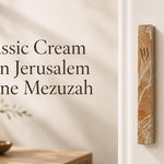 Classic Cream Vein Jerusalem Stone mezuzah case installed on a light doorway with natural cream stone veining