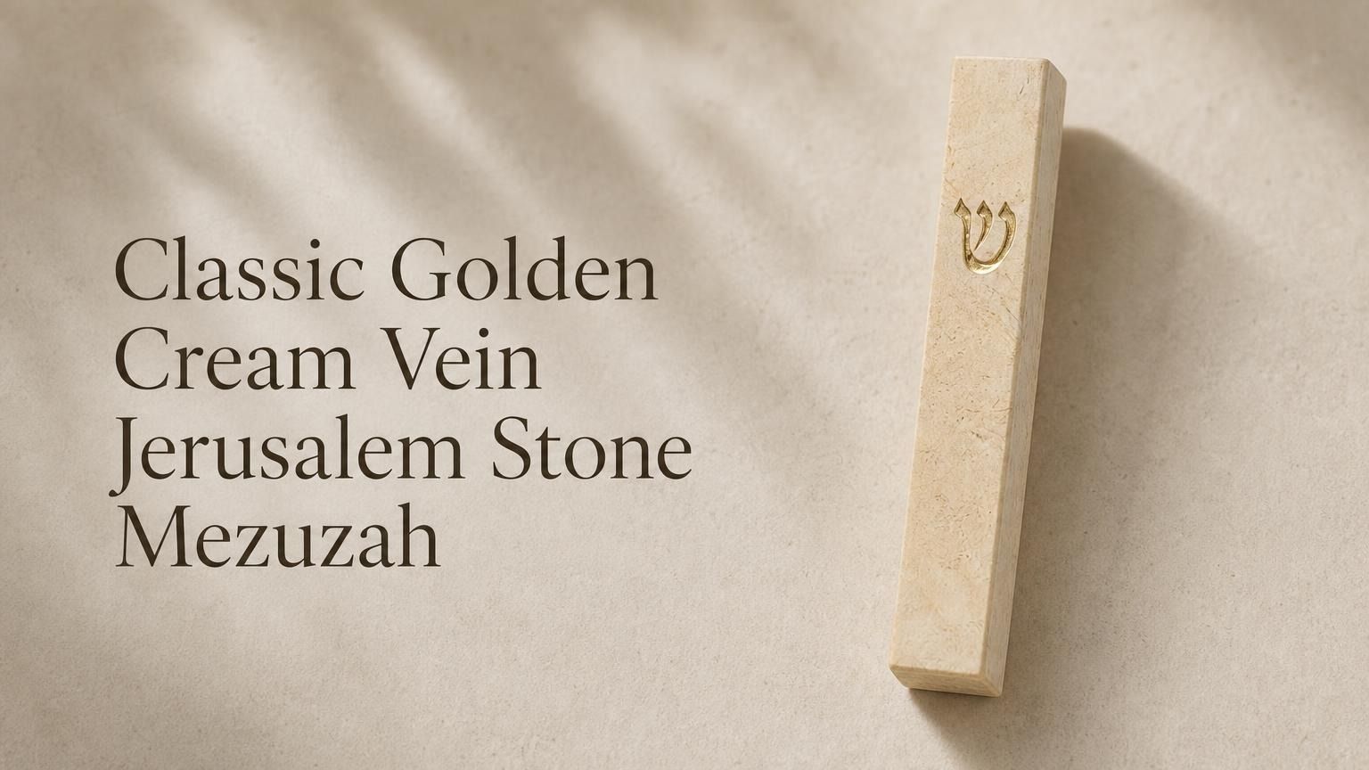 Cream Jerusalem stone mezuzah case with gold-tone Shin mounted on a pale limestone surface