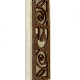Elegant Jerusalem stone Mezuzah-Shin with natural variations, engraved Hebrew letter Shin, and decorative motifs, mounted on a white background.