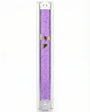 Transparent purple Lucite Mezuzah with Hebrew lettering, displayed upright against a white background with soft reflection.