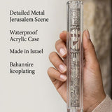 Close-up of the Clear Jerusalem Silver Plaque Lucite Mezuzah held in hands, highlighting its craftsmanship and detailed design.