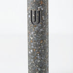 Colorful cement Mezuzah case with modern design and durable finish, mounted on a clean white background with a soft reflection below.