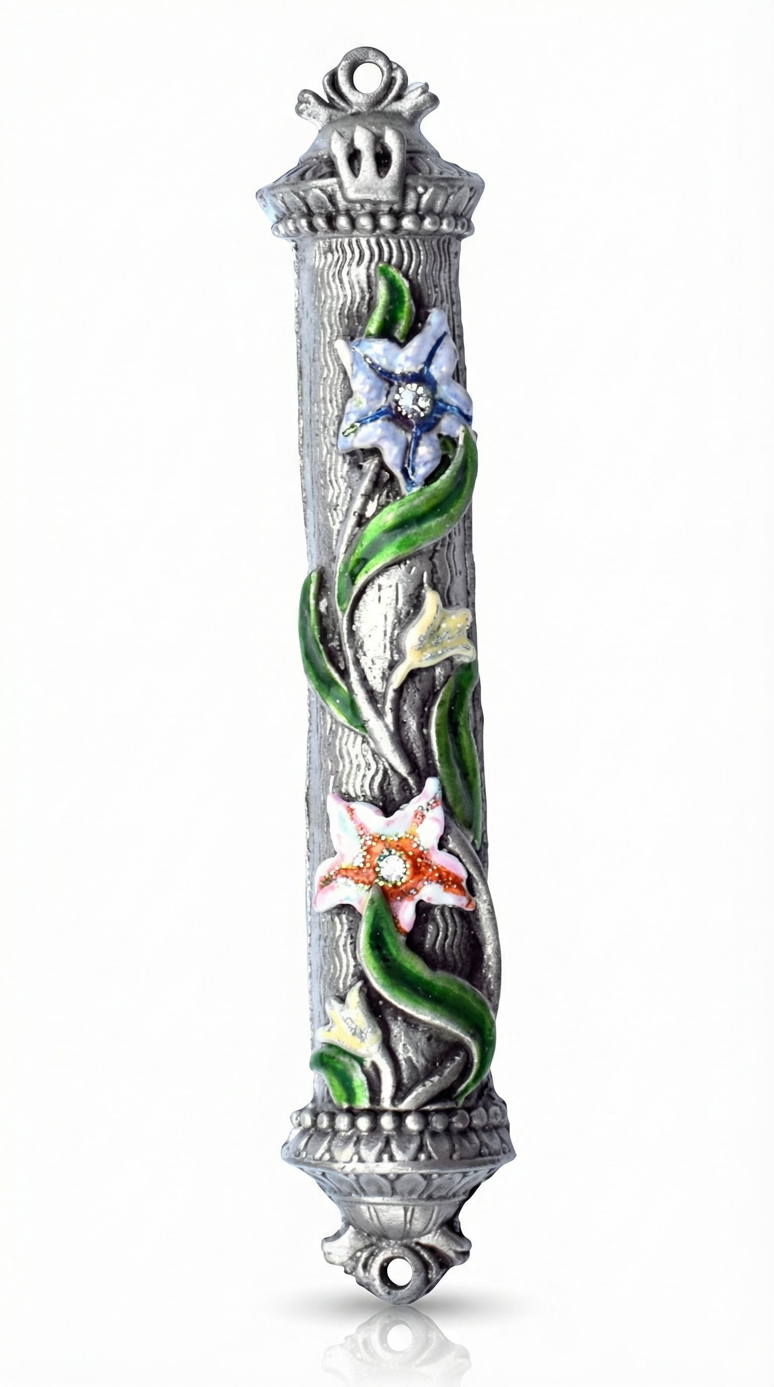 Vibrant hand-painted floral enamel mezuzah with crystal accents on pewter, displayed vertically against a clean white studio background with a subtle reflection.