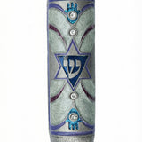 Handcrafted Israel-made pewter mezuzah with Star of David, Shin letter, Hamsas, crystals, vivid enamel colors, on white background with soft reflection.
