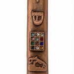 Copper Mezuzah made in the USA, measuring 6.5 inches tall by 1.1 inches wide, with fine engraved Hebrew letters, decorative motifs, and a polished finish.