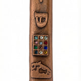 Copper Mezuzah made in the USA, measuring 6.5 inches tall by 1.1 inches wide, with fine engraved Hebrew letters, decorative motifs, and a polished finish.
