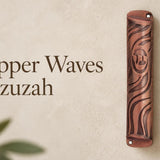 Copper Waves Mezuzah case with wave pattern and Hebrew Shin medallion on a soft grey background.