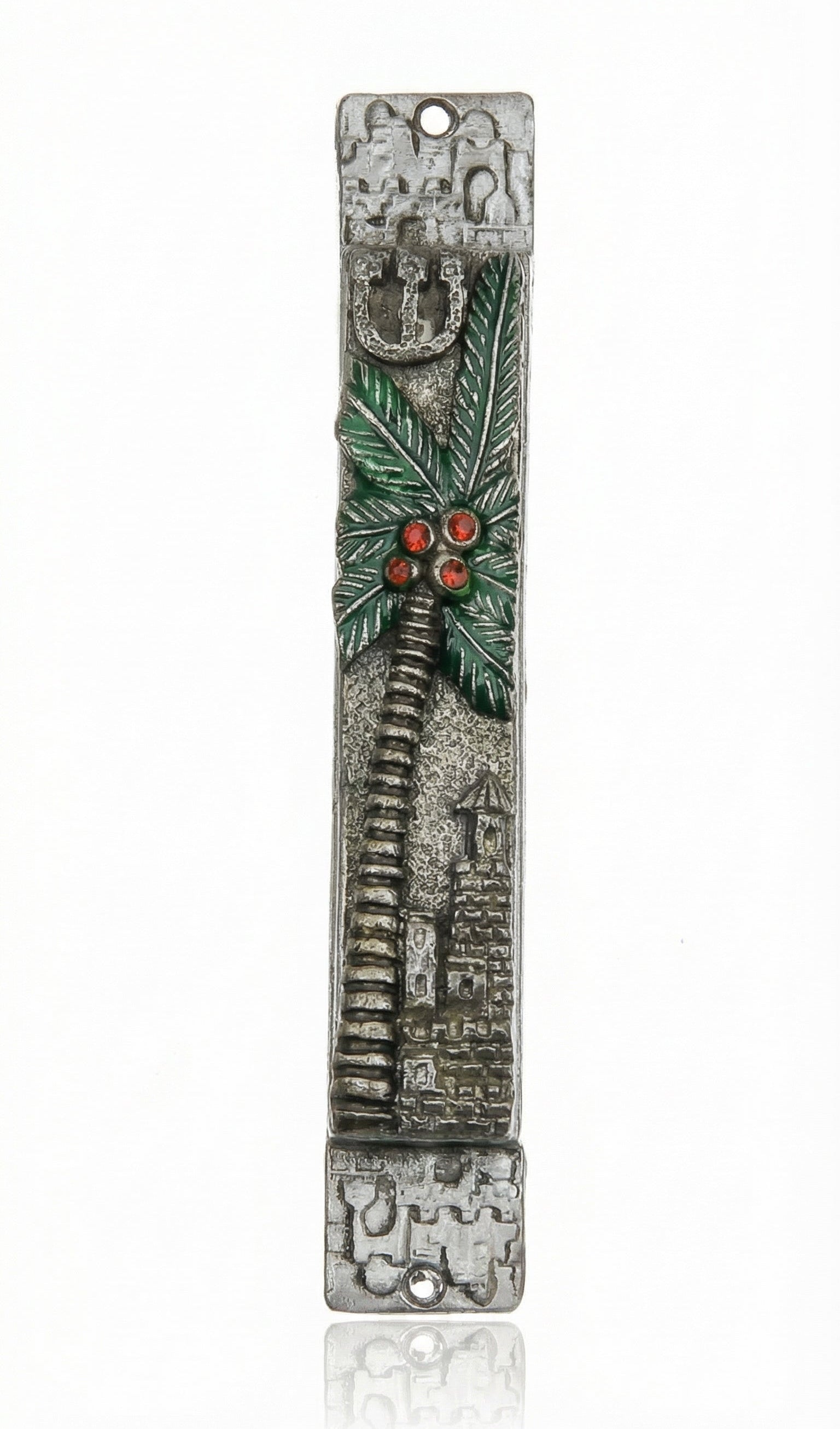 Detailed view of a handcrafted pewter mezuzah with colorful enamel accents, mounted on a white background with soft studio reflection.