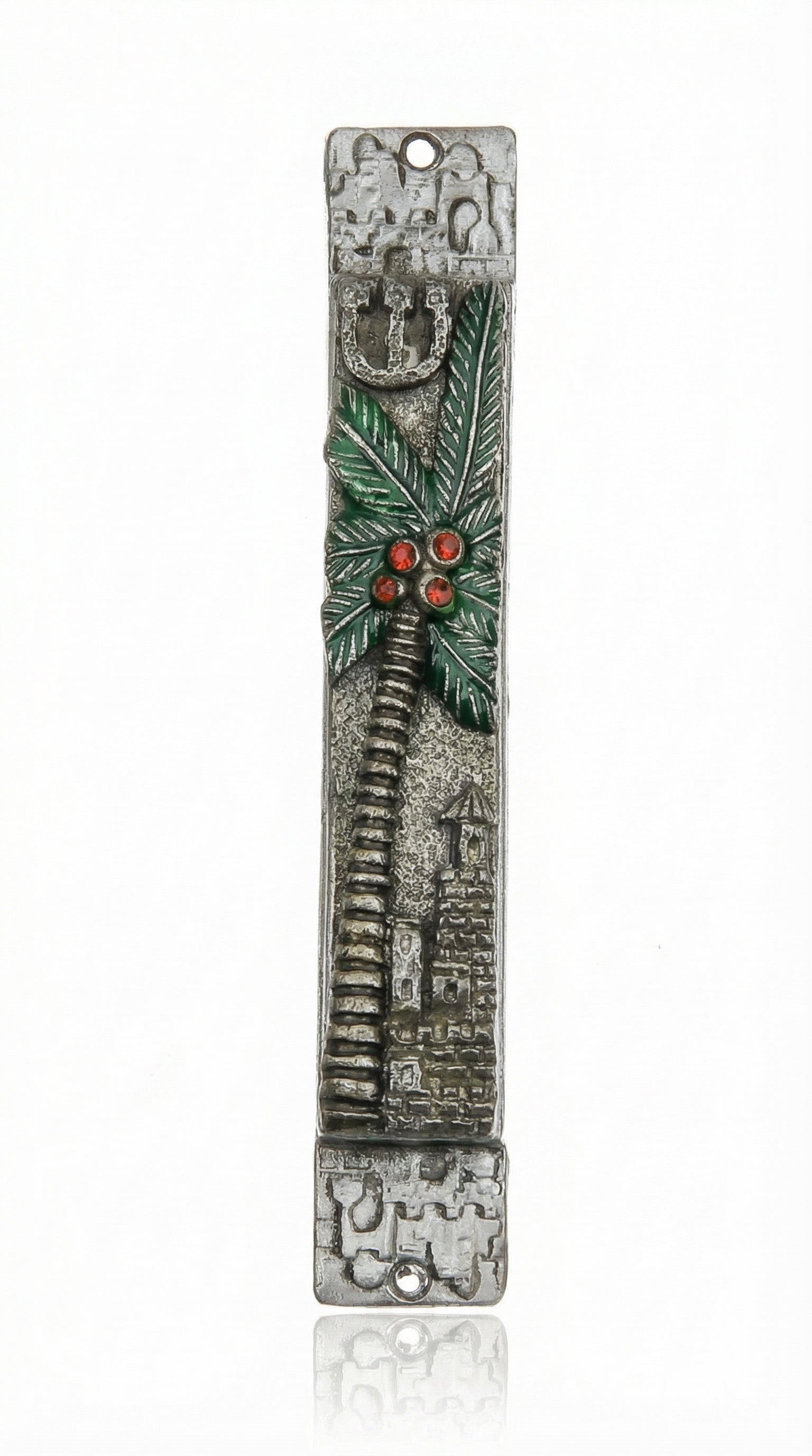 Detailed view of a handcrafted pewter mezuzah with colorful enamel accents, mounted on a white background with soft studio reflection.