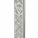 Elegant glass mezuzah with Hebrew engravings on a white background, featuring a light reflection on a polished surface.