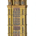 Die Neue Synagoge Berlin Mezuzah shown from the front as a mezuzah cover featuring golden ochre Fimo polymer clay shaped as the Berlin synagogue facade, with gray domes, tall windows and fine architectural relief, presenting a detailed Judaica design for a Jewish home doorway