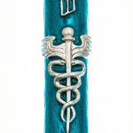 Hand-painted pewter doctor mezuzah with Hebrew inscriptions, designed for doctors, on a clean white background with subtle reflection.