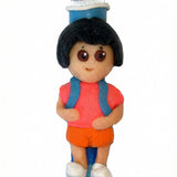 Adorable Dora the Explorer children's Mezuzah made in Israel, featuring detailed design and Hebrew inscriptions, mounted on a white background.