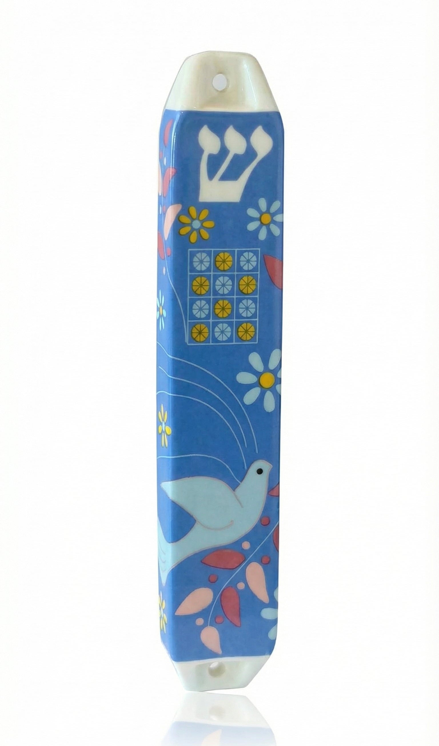 High-resolution image of an intricately detailed ceramic Dove of Peace Mezuzah with Hebrew inscriptions, displayed on a white studio surface with a subtle reflection.