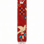 Decorative red mezuzah case with bird design red ceramic with blue and white accents and an uplifting dove motif for a colorful doorway