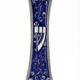 High-resolution image of a pewter Mezuzah with hand-painted enamel, detailed engravings, Hebrew inscriptions, and decorative motifs on a white studio background with soft reflection.
