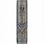 Eli Mezuzah crafted from pewter, 4 inches tall, designed for home doors, with detailed engraved Hebrew letters and decorative motifs.