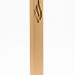 Close-up of the Eternal Flame Gold Aluminum Mezuzah with Hebrew emblem and slim rectangular shape, suitable for indoor and outdoor doors.