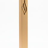 Close-up of the Eternal Flame Gold Aluminum Mezuzah with Hebrew emblem and slim rectangular shape, suitable for indoor and outdoor doors.